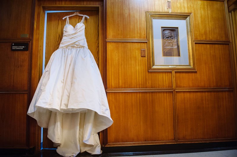 wedding dress hanging inside Temple Israel wedding Minneapolis MN