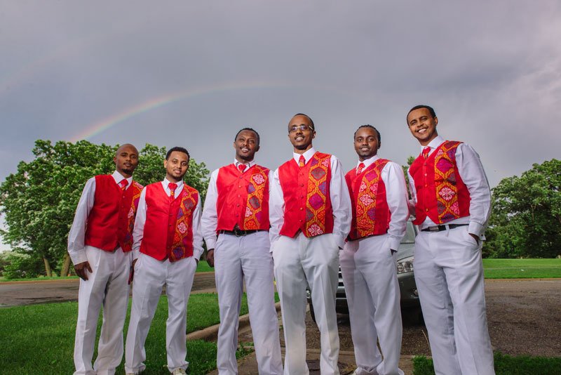 Ethiopian wedding groomsmen with rainbow