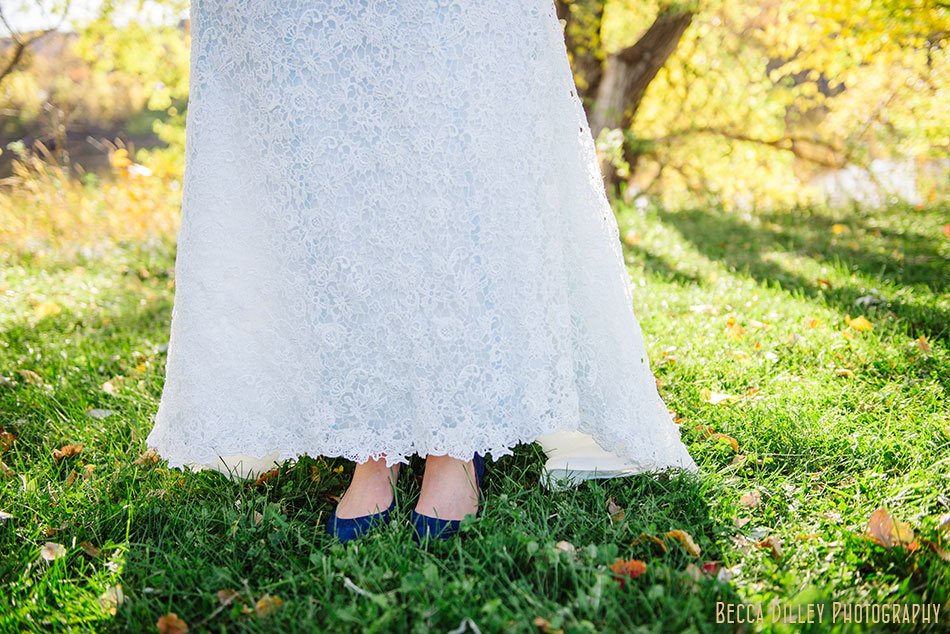 bride with blue tinted dress and blue shoes