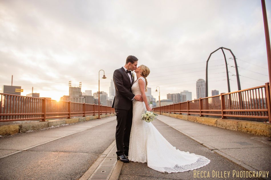 stone arch bridge wedding photos at dusk