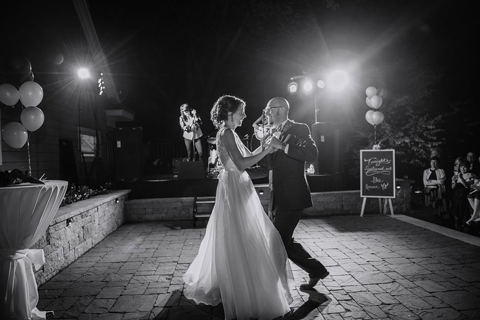 bride and groom first dance to lower 48 White Bear Lake Backyard Wedding