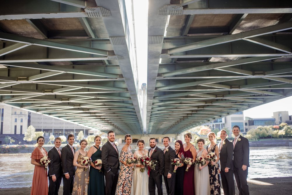 2017 favorite photos best Minneapolis photographer wedding party with nicollet bridge